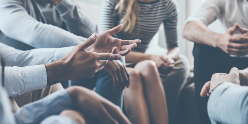 Conversation showing hands
