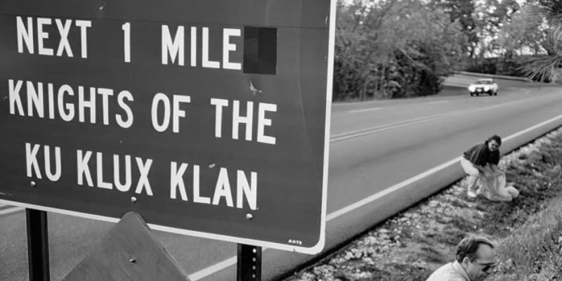 Photo of sign with the words - Litter Control, Klu Klux Klan